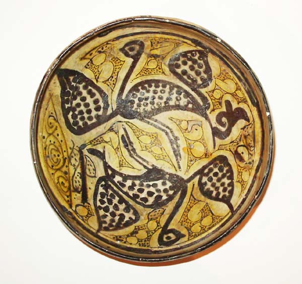 A Nishapur Slip-Painted Pottery Bowl, Islamic